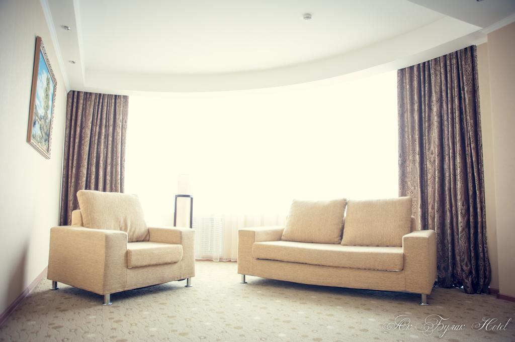Akbulak Hotel Astana Bagian luar foto